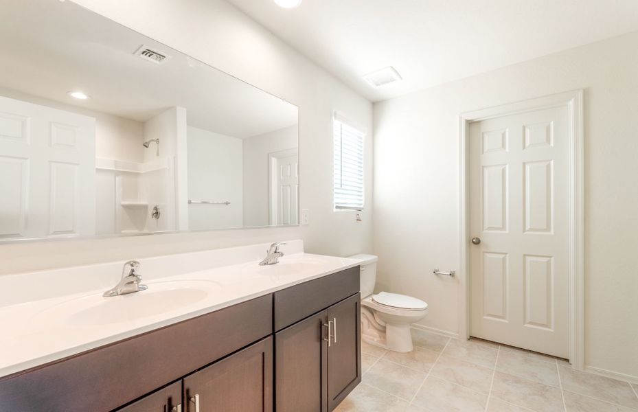 Furnished interior view inside a new home in Copper Falls, Buckeye (Image 9).