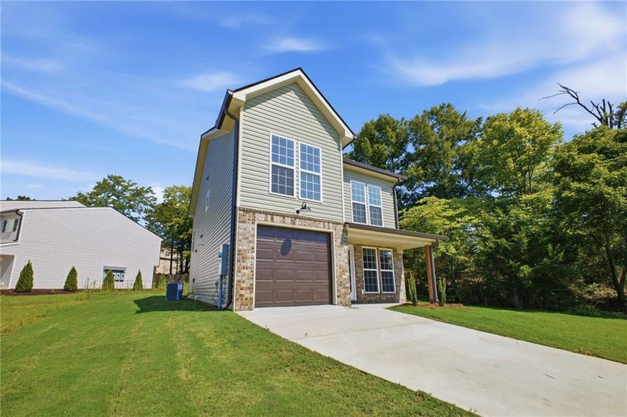 Front exterior of a new home in , Calhoun, GA, highlighting curb appeal (Image 27). Front exterior of a new home in , Calhoun, GA, highlighting curb appeal (Image 27).