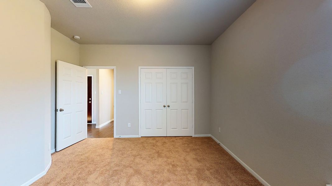 Representative unfurnished interior of a home built from the Floor Plan 3256 by Colina Homes in Grand Magnolia, Magnolia (Image 25).
