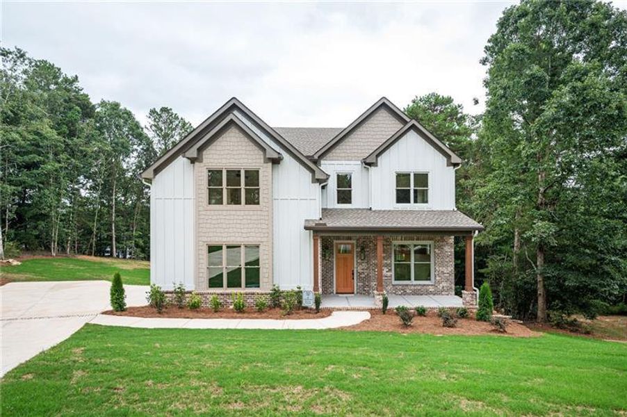 Front exterior of a new home in , Monroe, GA, highlighting curb appeal (Image 33).
