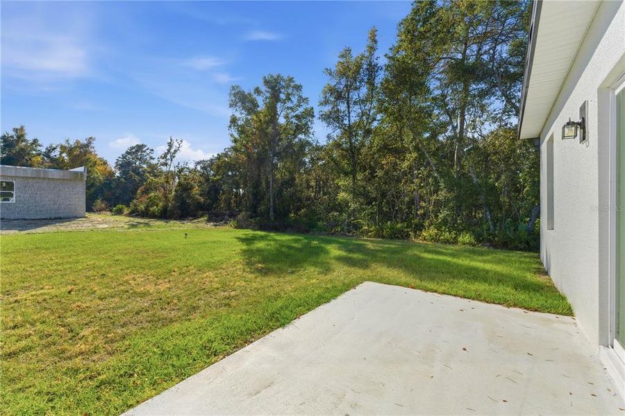 Exterior details and patio area of a home in , Ocala (Image 4).