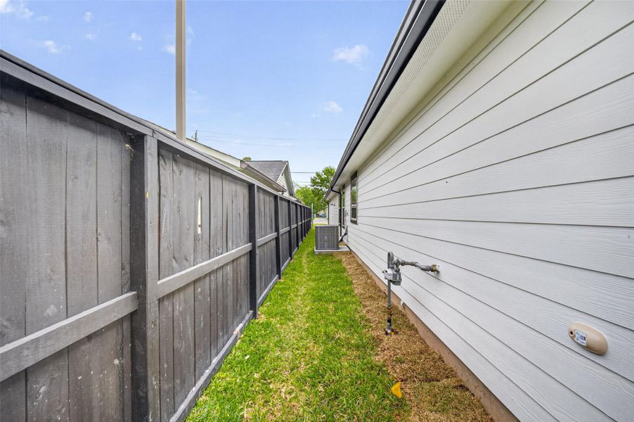 Exterior details and patio area of a home in , South Houston (Image 26).