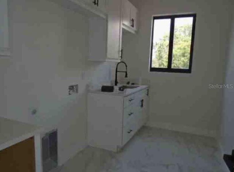 Furnished interior view inside a new home in , Tampa (Image 7).