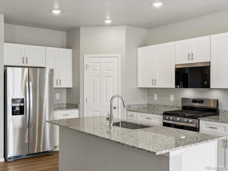 Furnished interior view inside a new home in Ridgeline Vista: The Flora Collection, Brighton (Image 12). Furnished interior view inside a new home in Ridgeline Vista: The Flora Collection, Brighton (Image 12).