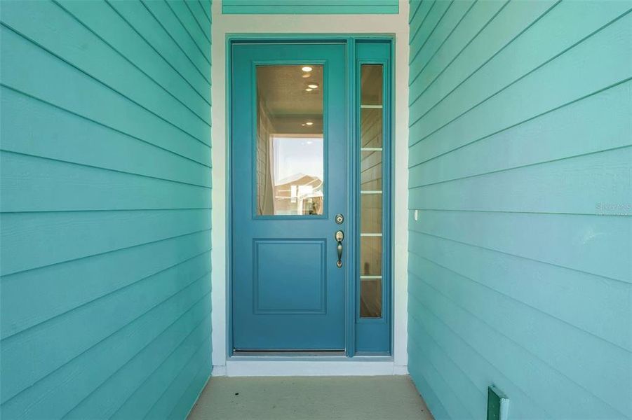 Exterior details and patio area of a home in Green Key Village, Lady Lake (Image 25).
