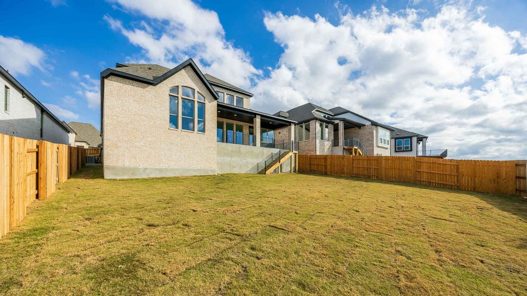 Exterior details and patio area of a home in Palmera Ridge 60', Leander (Image 2).