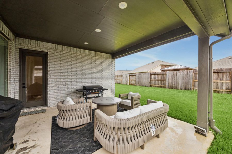 Spacious back covered patio is great for relaxing and entertaining. Spacious back covered patio is great for relaxing and entertaining.