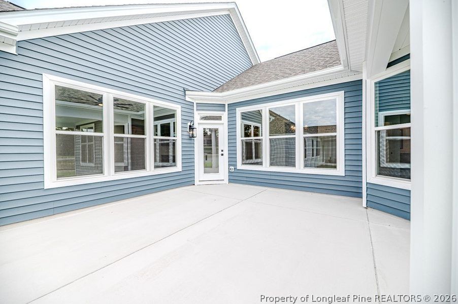 Exterior details and patio area of a home in The Cottages at 78 North, Sanford (Image 24). Exterior details and patio area of a home in The Cottages at 78 North, Sanford (Image 24).