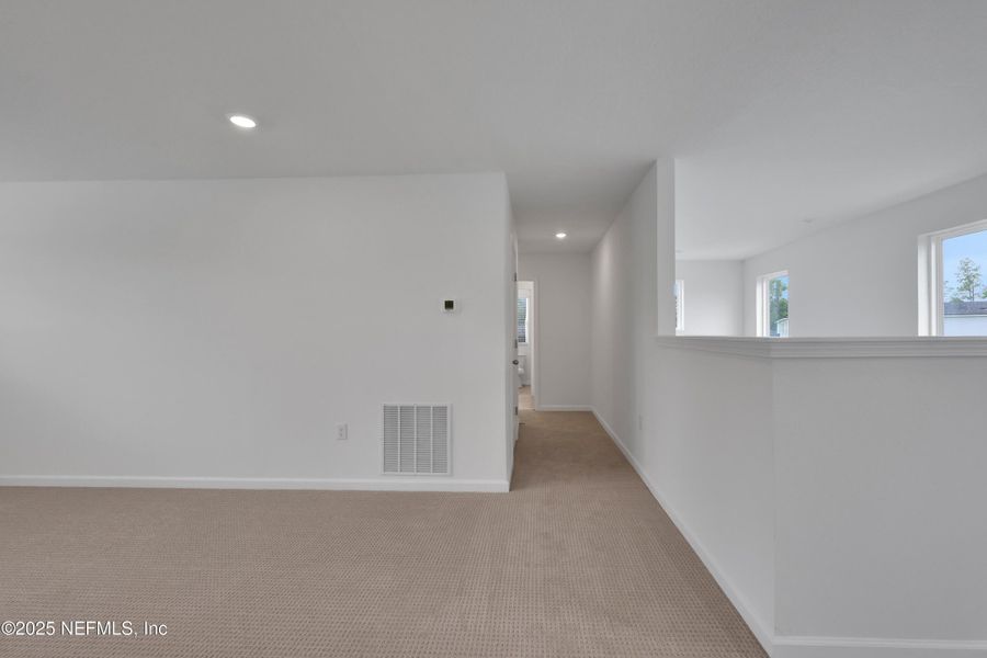 Spacious, unfurnished interior of a new home in Cordova Palms, St. Augustine (Image 24).