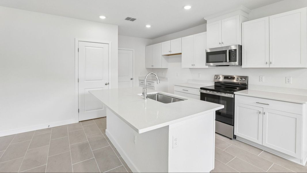 Furnished interior view inside a new home in Cyrene at Harmony, St. Cloud (Image 13).