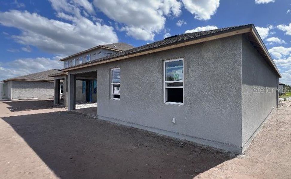 Exterior details and patio area of a home in Sunbrooke, St. Cloud (Image 3).