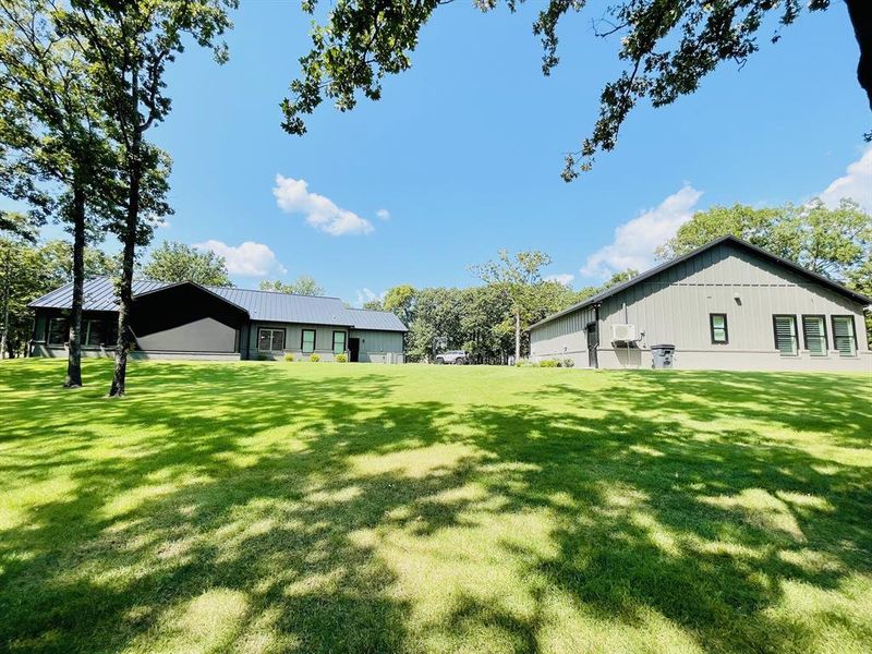 Front exterior of a new home in , Yantis, TX, highlighting curb appeal (Image 19). Front exterior of a new home in , Yantis, TX, highlighting curb appeal (Image 19).