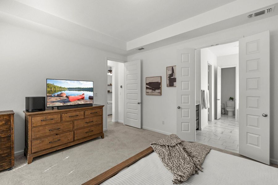 Furnished interior view inside a new home in Parkside on the River, Georgetown (Image 11).