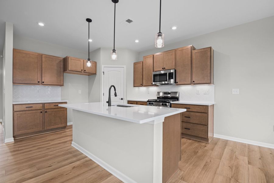 Representative furnished interior of a home built from the Edenton by Fischer Homes in Easton Park, Dallas (Image 6).