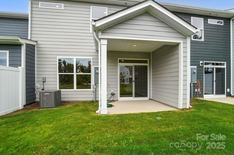 Front exterior of a new home in Harrisburg Village, Harrisburg, NC, highlighting curb appeal (Image 26). Front exterior of a new home in Harrisburg Village, Harrisburg, NC, highlighting curb appeal (Image 26).