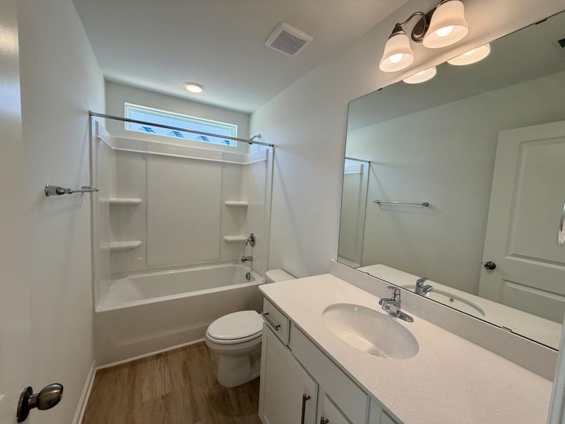 Furnished interior view inside a new home in Bellevue Townhomes, Greenville (Image 9).
