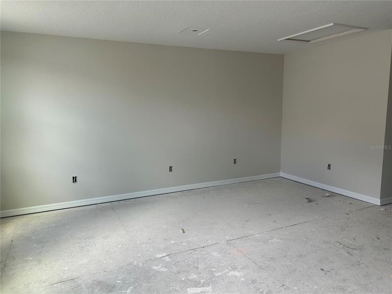 In-progress construction of a new home in Oakfield Trails Signature, Parrish, FL (Image 10).