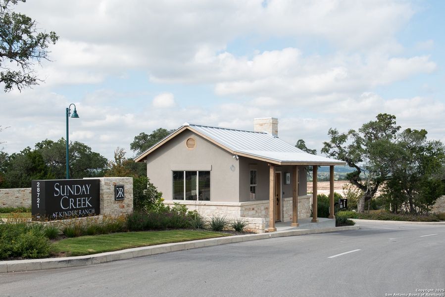 Front exterior of a new home in Sunday Creek at Kinder Ranch, San Antonio, TX, highlighting curb appeal (Image 2). Front exterior of a new home in Sunday Creek at Kinder Ranch, San Antonio, TX, highlighting curb appeal (Image 2).