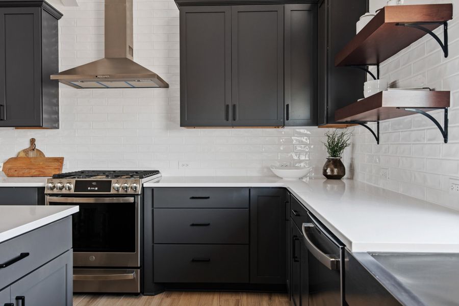 Kitchen with island, pendant lighting and open shelving Kitchen with island, pendant lighting and open shelving