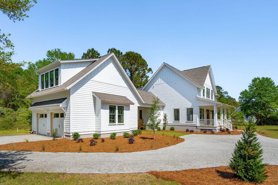 Front exterior of a new home in , Johns Island, SC, highlighting curb appeal (Image 1).