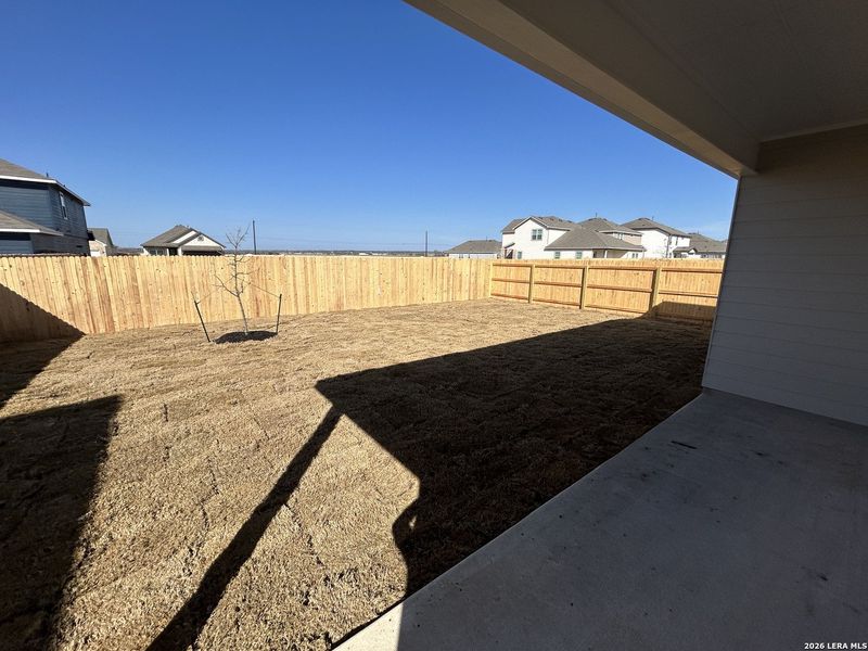 Exterior details and patio area of a home in Hennersby Hollow, San Antonio (Image 22).
