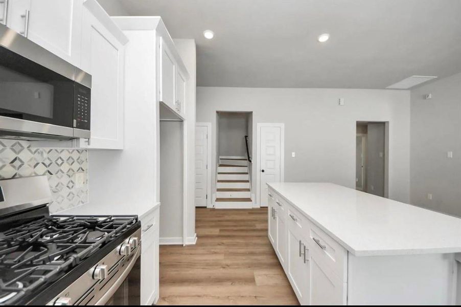 Furnished interior view inside a new home in , Manvel (Image 5).