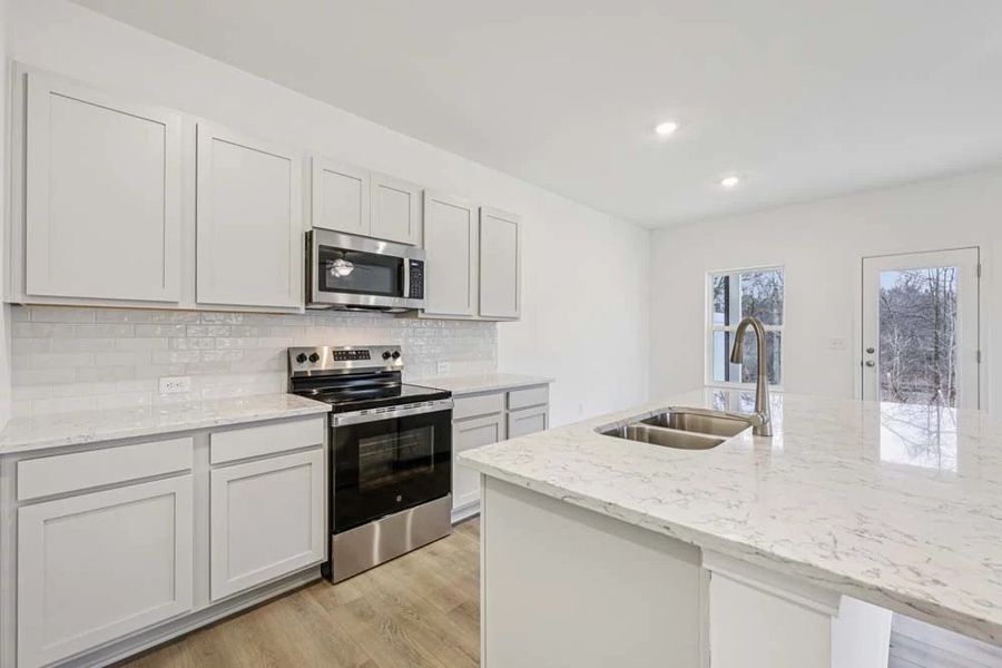 Kitchen featuring Milan Collection Finishes