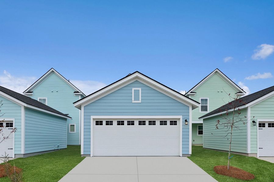 Front exterior of a new home in Nexton - Midtown - The Park Collection, Summerville, SC, highlighting curb appeal (Image 2). Front exterior of a new home in Nexton - Midtown - The Park Collection, Summerville, SC, highlighting curb appeal (Image 2).