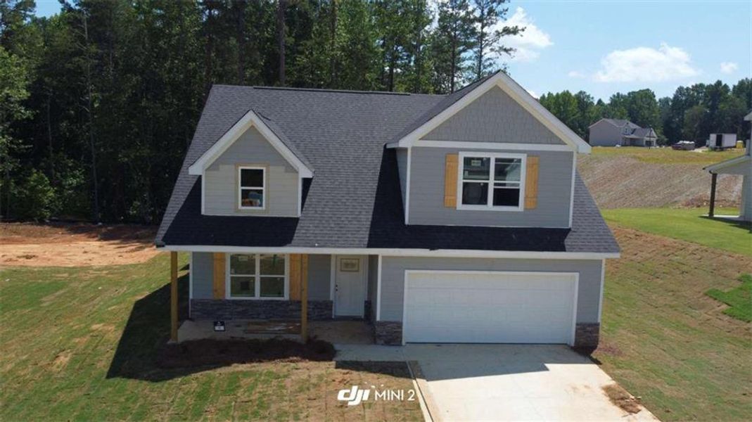 Front exterior of a new home in , Lula, GA, highlighting curb appeal (Image 1). Front exterior of a new home in , Lula, GA, highlighting curb appeal (Image 1).