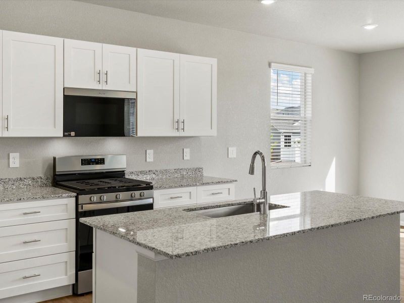 Furnished interior view inside a new home in Ridgeline Vista: The Flora Collection, Brighton (Image 13). Furnished interior view inside a new home in Ridgeline Vista: The Flora Collection, Brighton (Image 13).