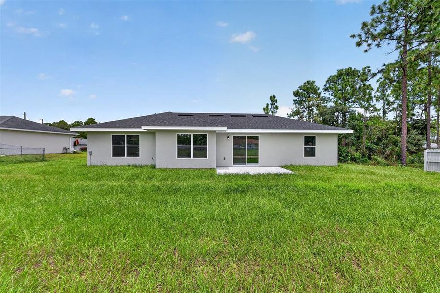 Exterior details and patio area of a home in , Ocala (Image 3).