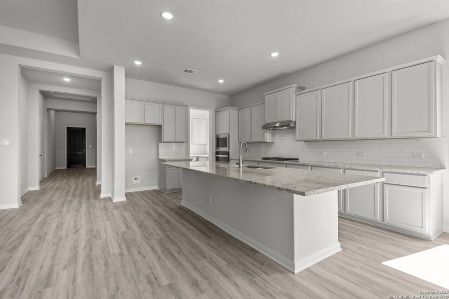 Furnished interior view inside a new home in Stillwater Ranch 60', San Antonio (Image 9).