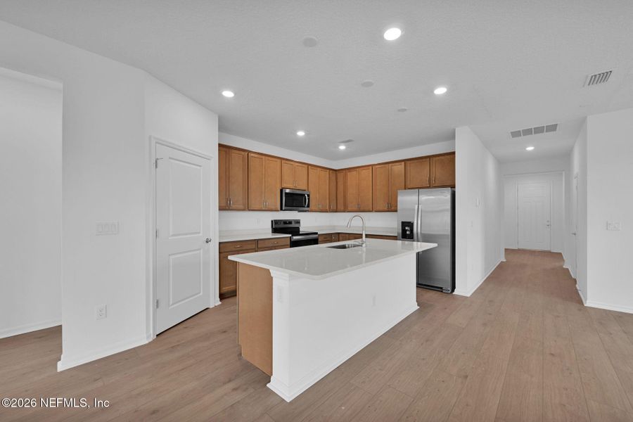 Furnished interior view inside a new home in Hyland Trail, Green Cove Springs (Image 9).