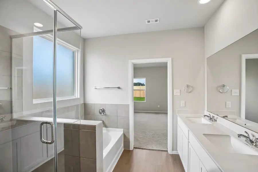 Furnished interior view inside a new home in Sorella, Tomball (Image 9).
