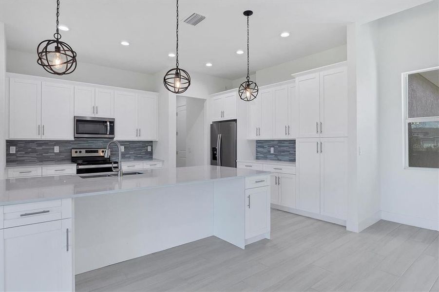 Furnished interior view inside a new home in , Port Charlotte (Image 2).