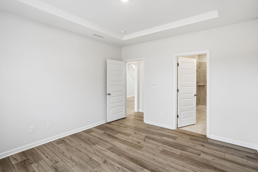 Spacious, unfurnished interior of a new home in Ovation at Sweetbrier, Durham (Image 24).