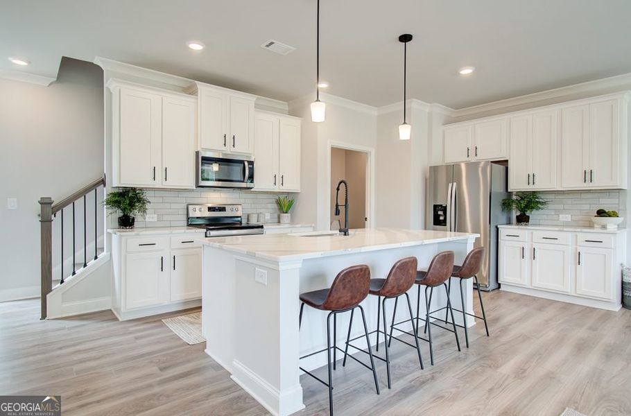 Furnished interior view inside a new home in The Towns at Auburn Station West, Auburn (Image 8).