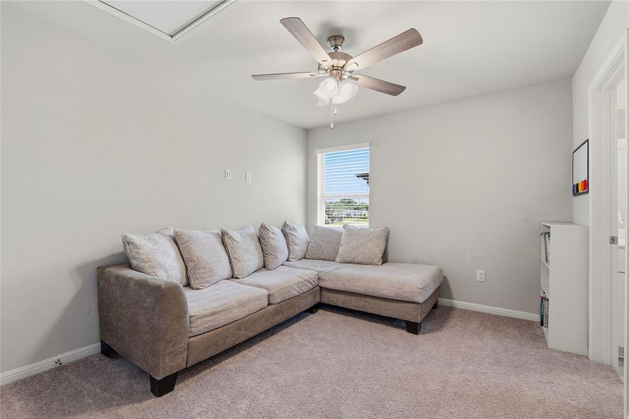 Furnished interior view inside a new home in Crosswinds, Kyle (Image 13).