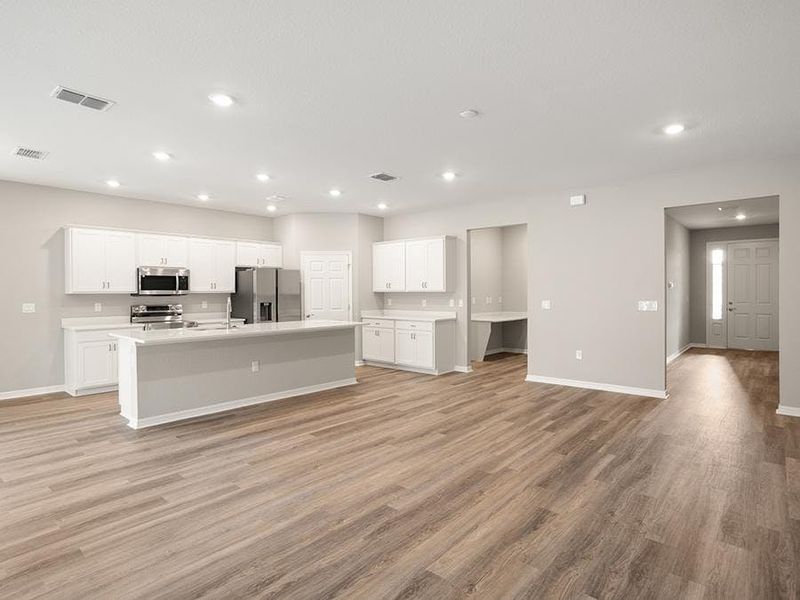 Enjoy a bright, open living area with low-maintenance LVP flooring.