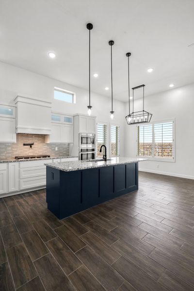 Representative furnished interior of a home built from the Scottsdale by LEH. Homes in Verdancia, El Paso (Image 19).