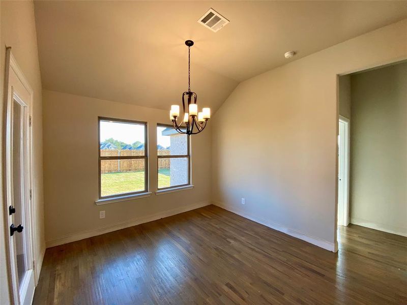 Breakfast cafe off of the kitchen with Oil Rubbed Bronze chandelier. Breakfast cafe off of the kitchen with Oil Rubbed Bronze chandelier.