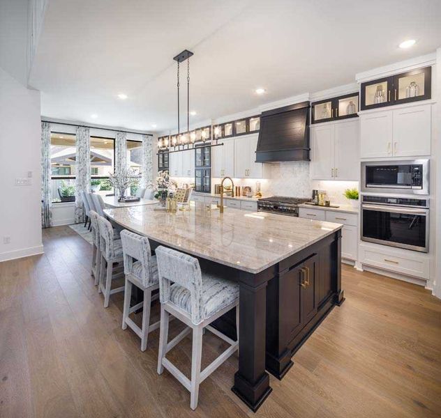 Representative furnished interior of a home built from the 222G by Highland Homes in Quail Hollow, Rockwall (Image 14).