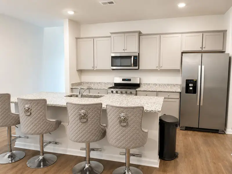 Furnished interior view inside a new home in Pine Hills at Cane Bay, Summerville (Image 13).