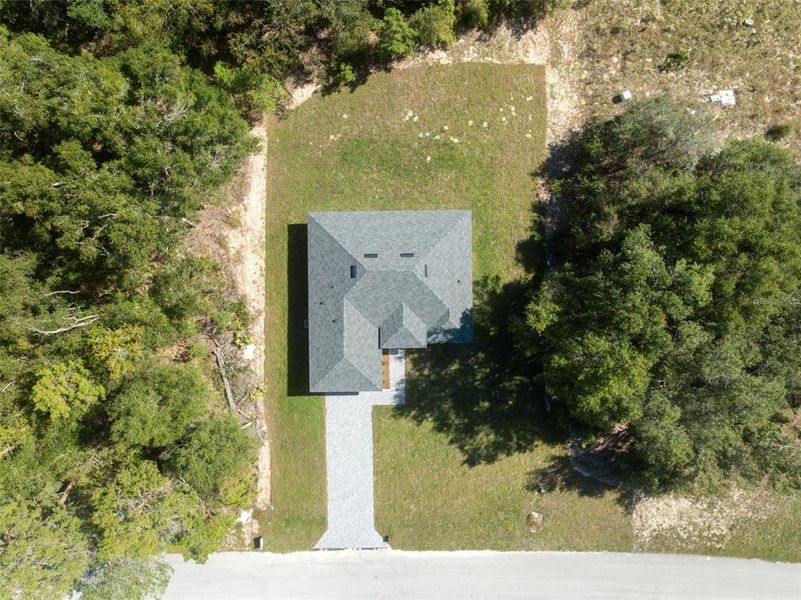 Front exterior of a new home in , Ocala, FL, highlighting curb appeal (Image 20). Front exterior of a new home in , Ocala, FL, highlighting curb appeal (Image 20).