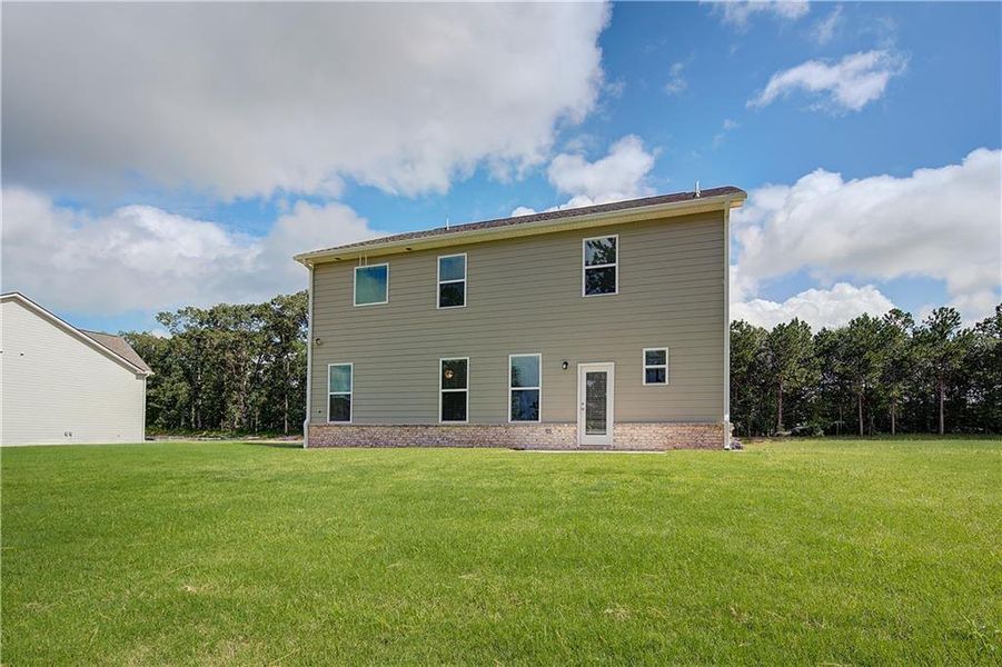 Front exterior of a new home in Westminster, Covington, GA, highlighting curb appeal (Image 2).