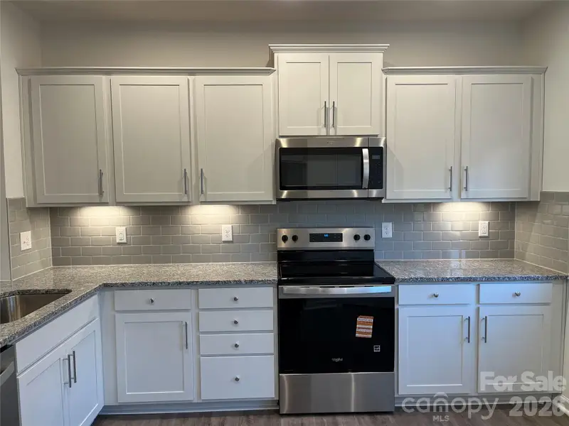 Furnished interior view inside a new home in Parkside Crossing, Charlotte (Image 4).
