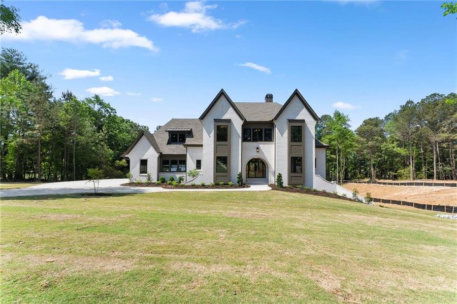 Front exterior of a new home in , Flowery Branch, GA, highlighting curb appeal (Image 25).