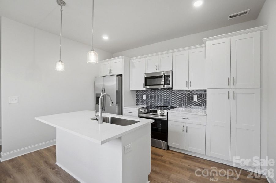 Furnished interior view inside a new home in , Charlotte (Image 5). Furnished interior view inside a new home in , Charlotte (Image 5).