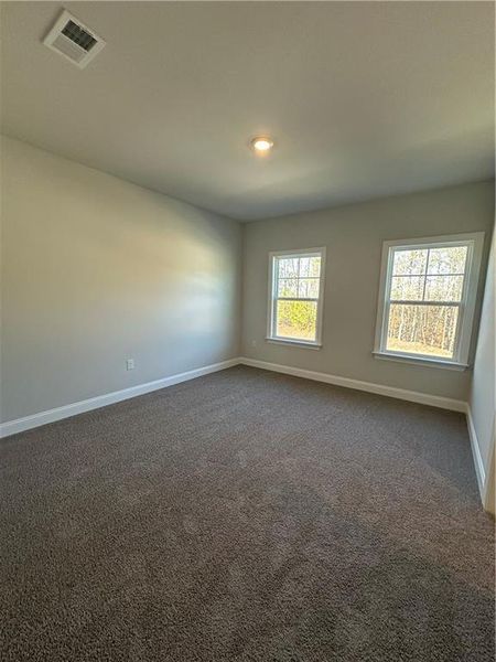 Spacious, unfurnished interior of a new home in Mirror Lake at South Harbour, Villa Rica (Image 17).