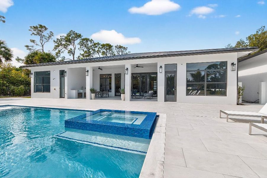 Exterior details and patio area of a home in , Jupiter (Image 3).